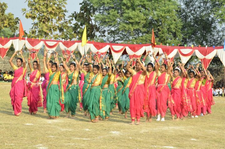 Students performing a folk dance