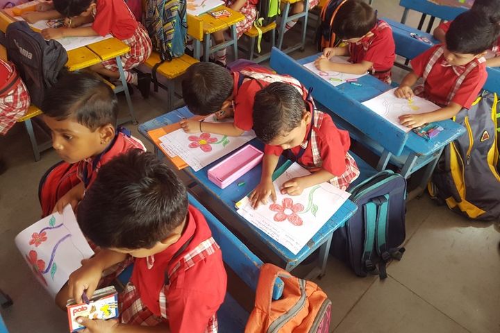 Young students drawing in class