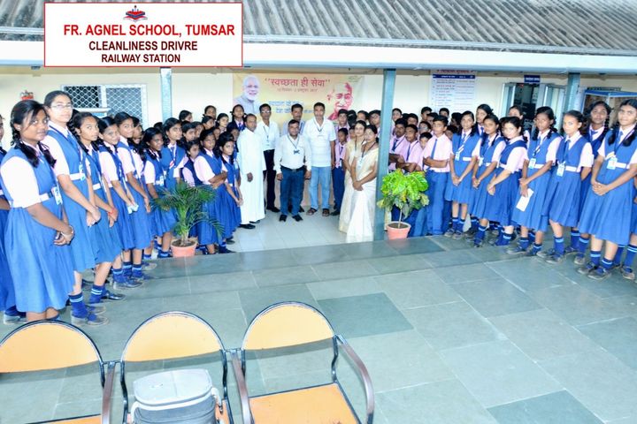 Students on a cleanliness drive at the railway station