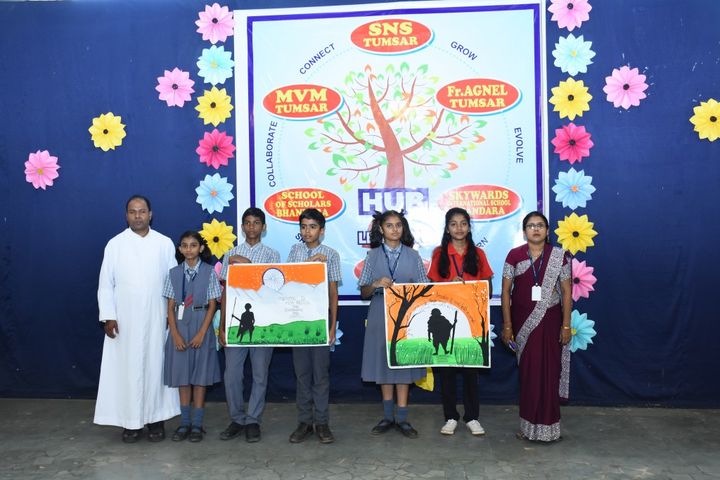 Students with their artwork at an inter-school event
